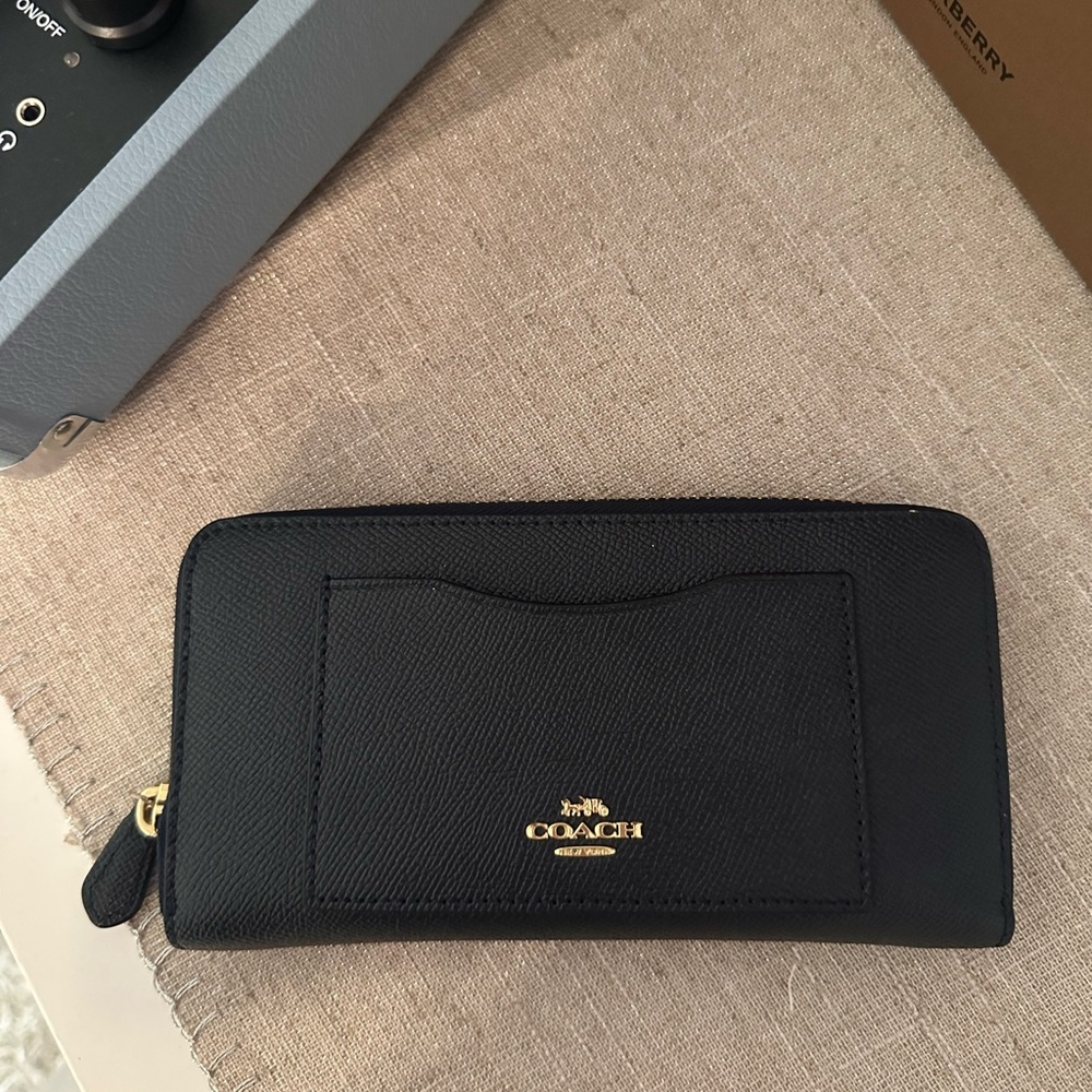 Navy Blue Coach clutch/wallet.